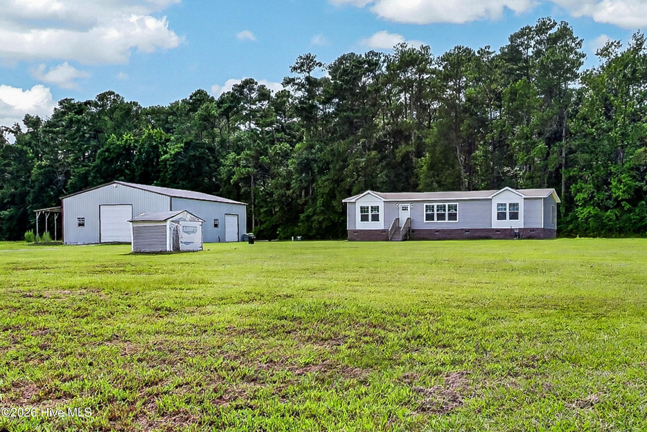 Front of 221 Myrtle Sholar Road, Wallace, NC 28466