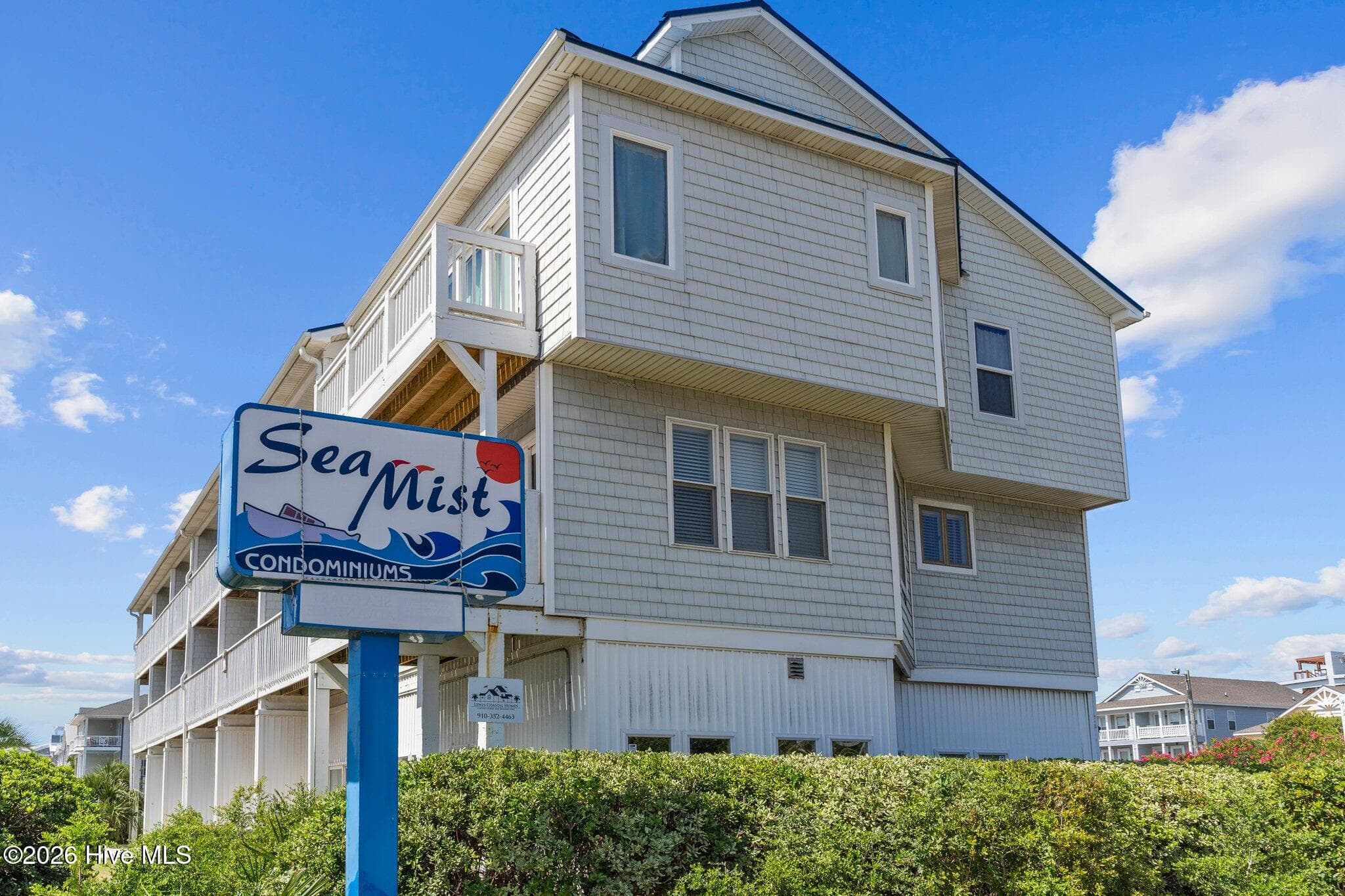 Front of 105 Tennessee Avenue Unit 206, Carolina Beach, NC 28428