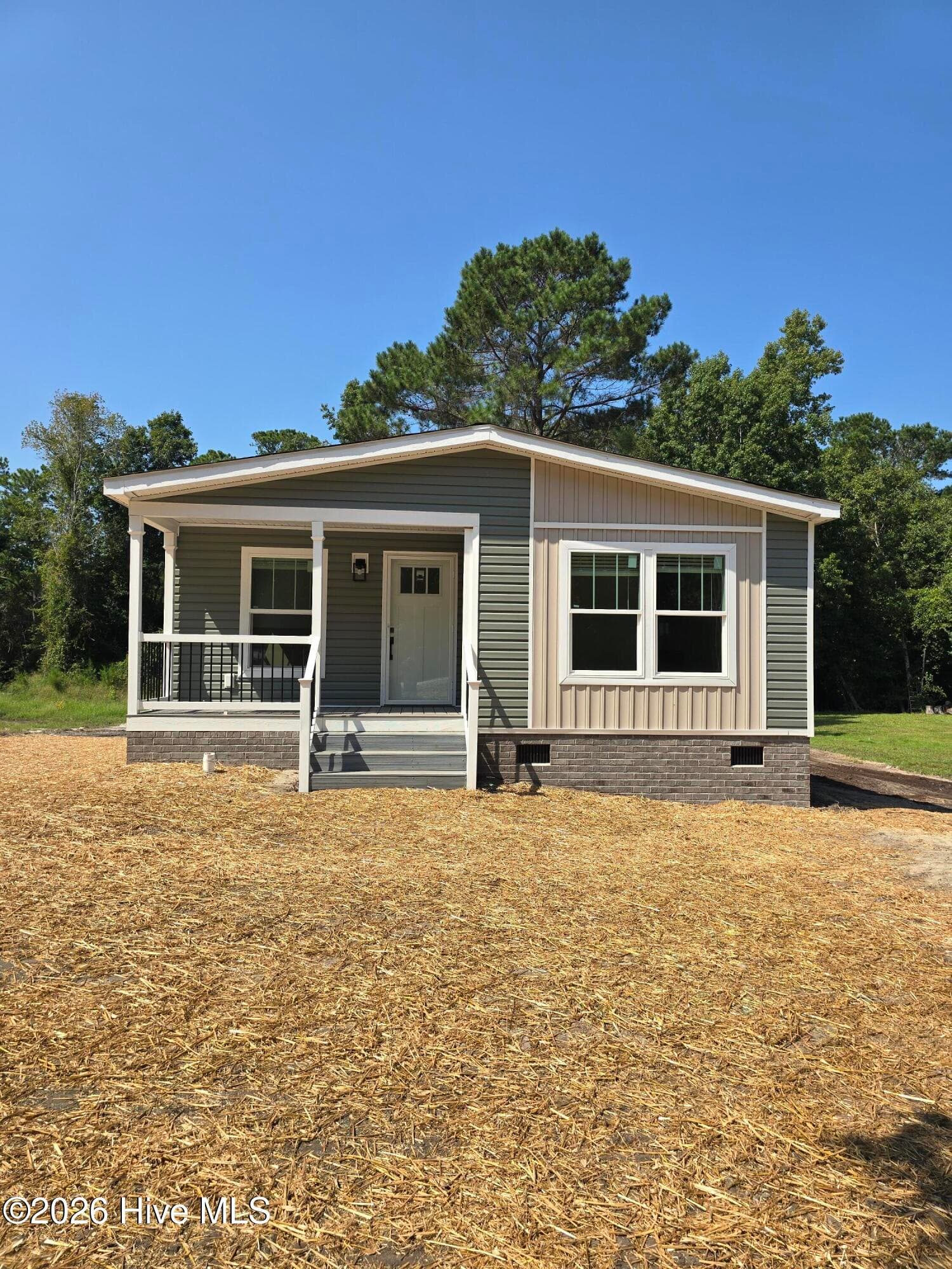 Front of 106 Dundee Trail, Holly Ridge, NC 28445