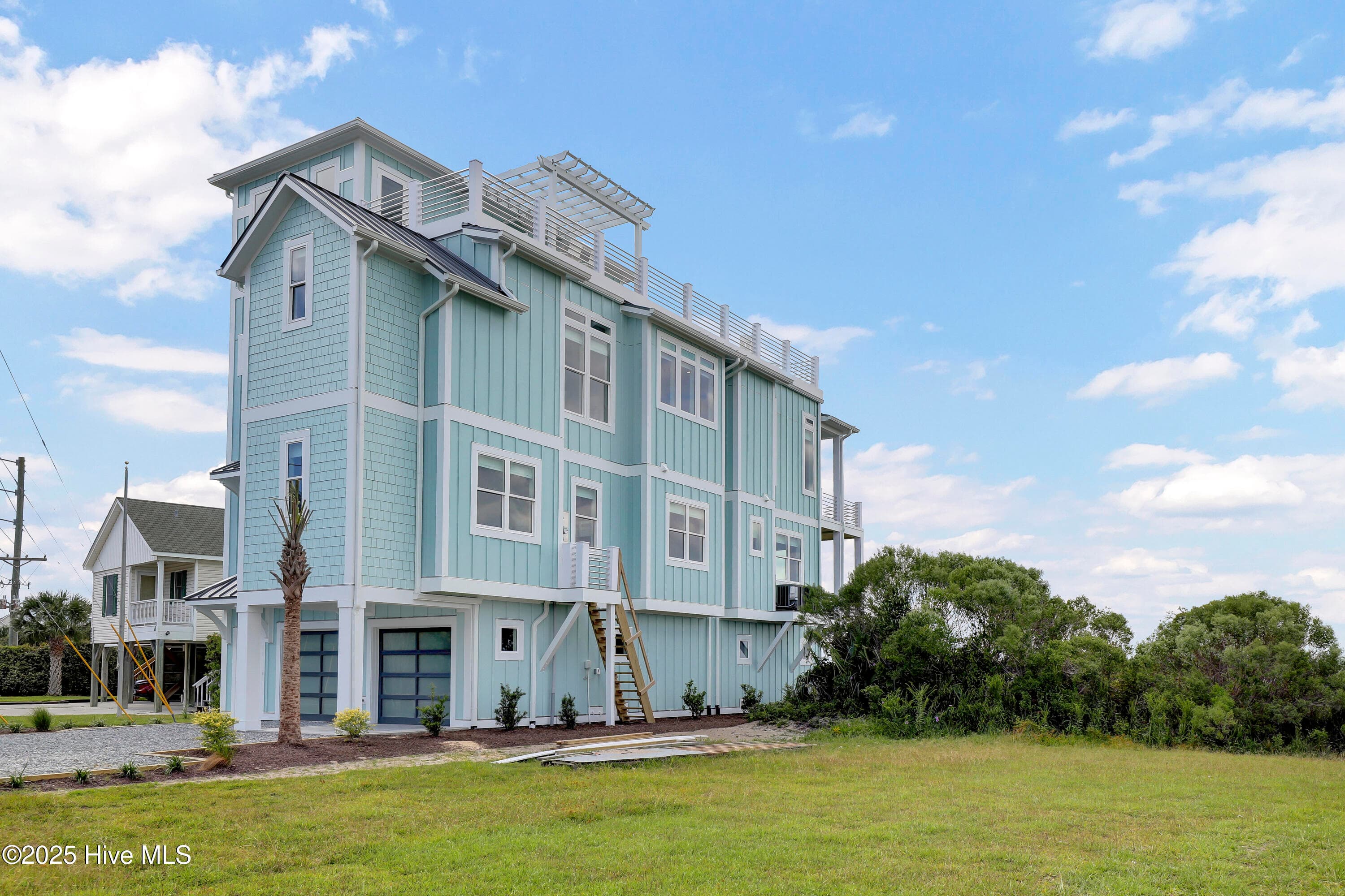 Front of 825 S Topsail Drive, Surf City, NC 28445