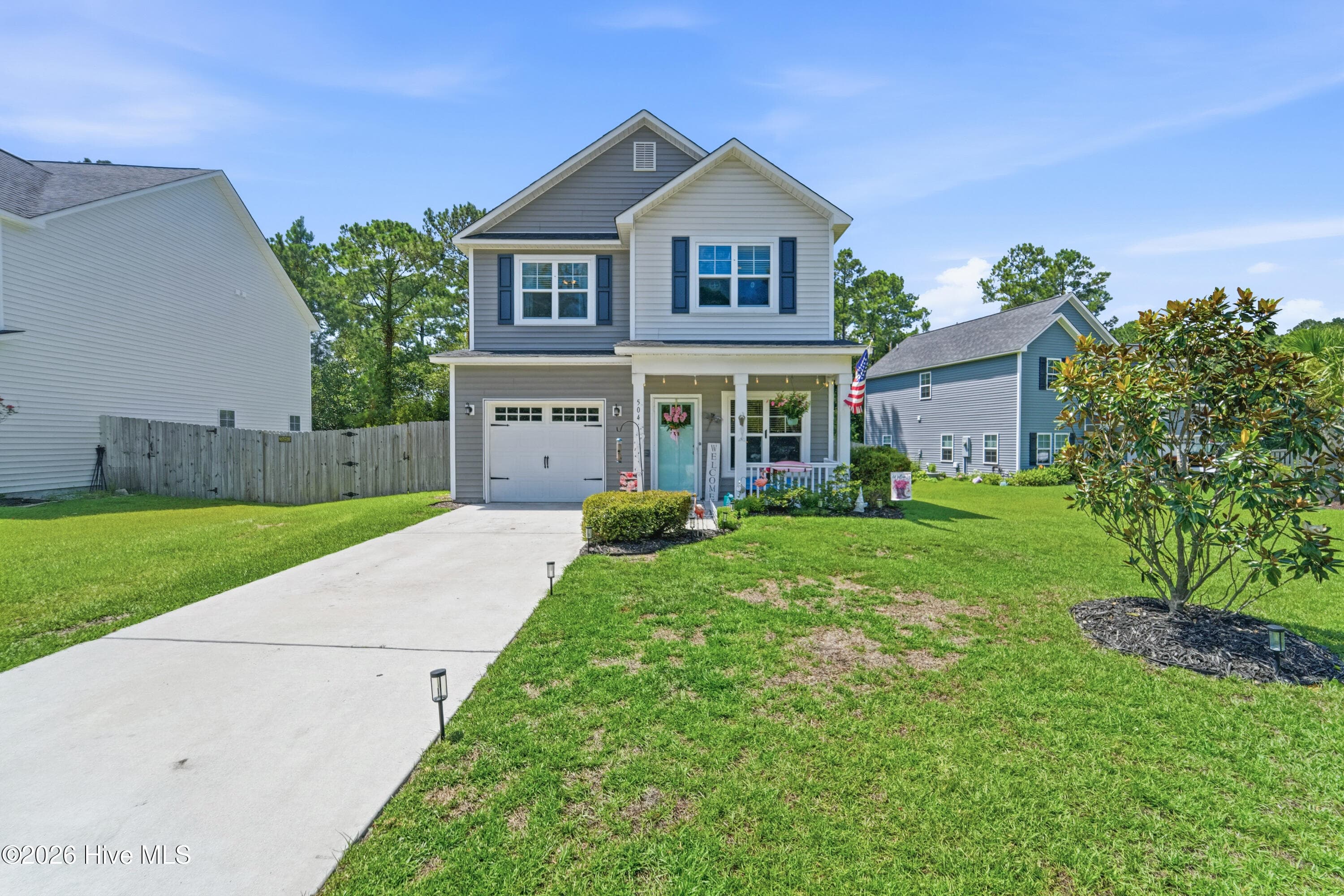 Front of 504 Everett Glades, Sneads Ferry, NC 28460