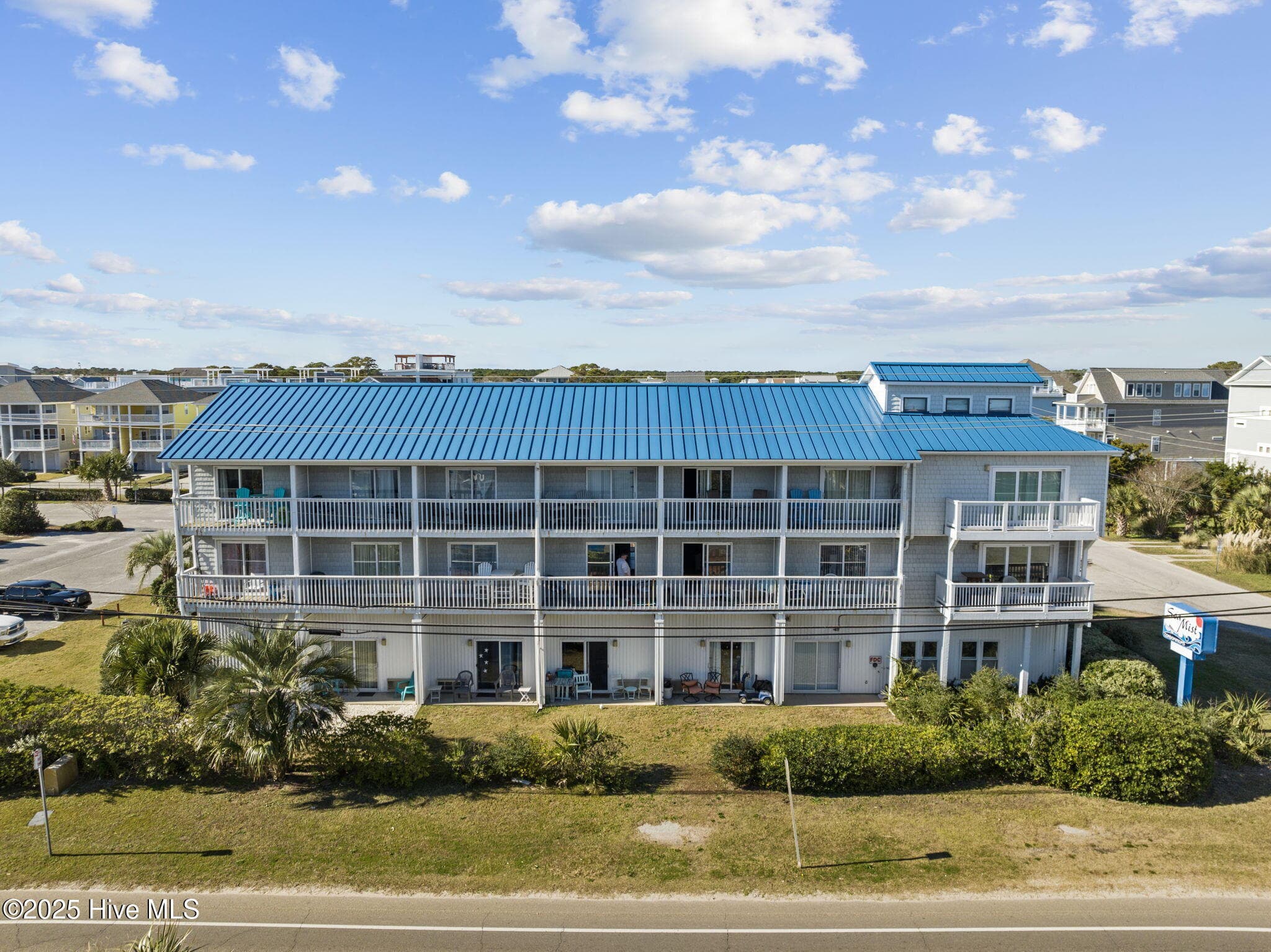 Front of 105 Tennessee Avenue Unit 203, Carolina Beach, NC 28428