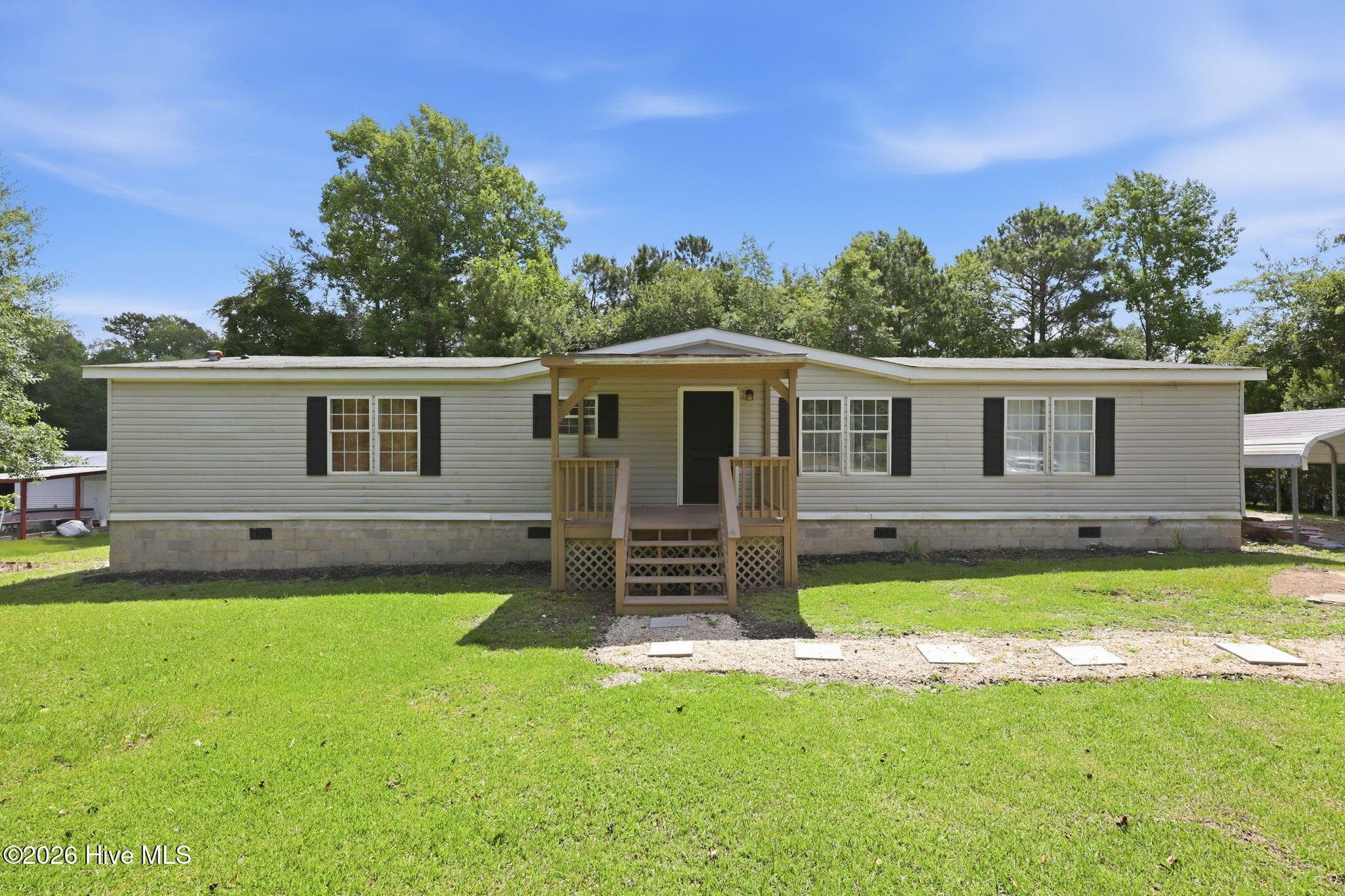 Front of 123 Youpon Drive, Hubert, NC 28539