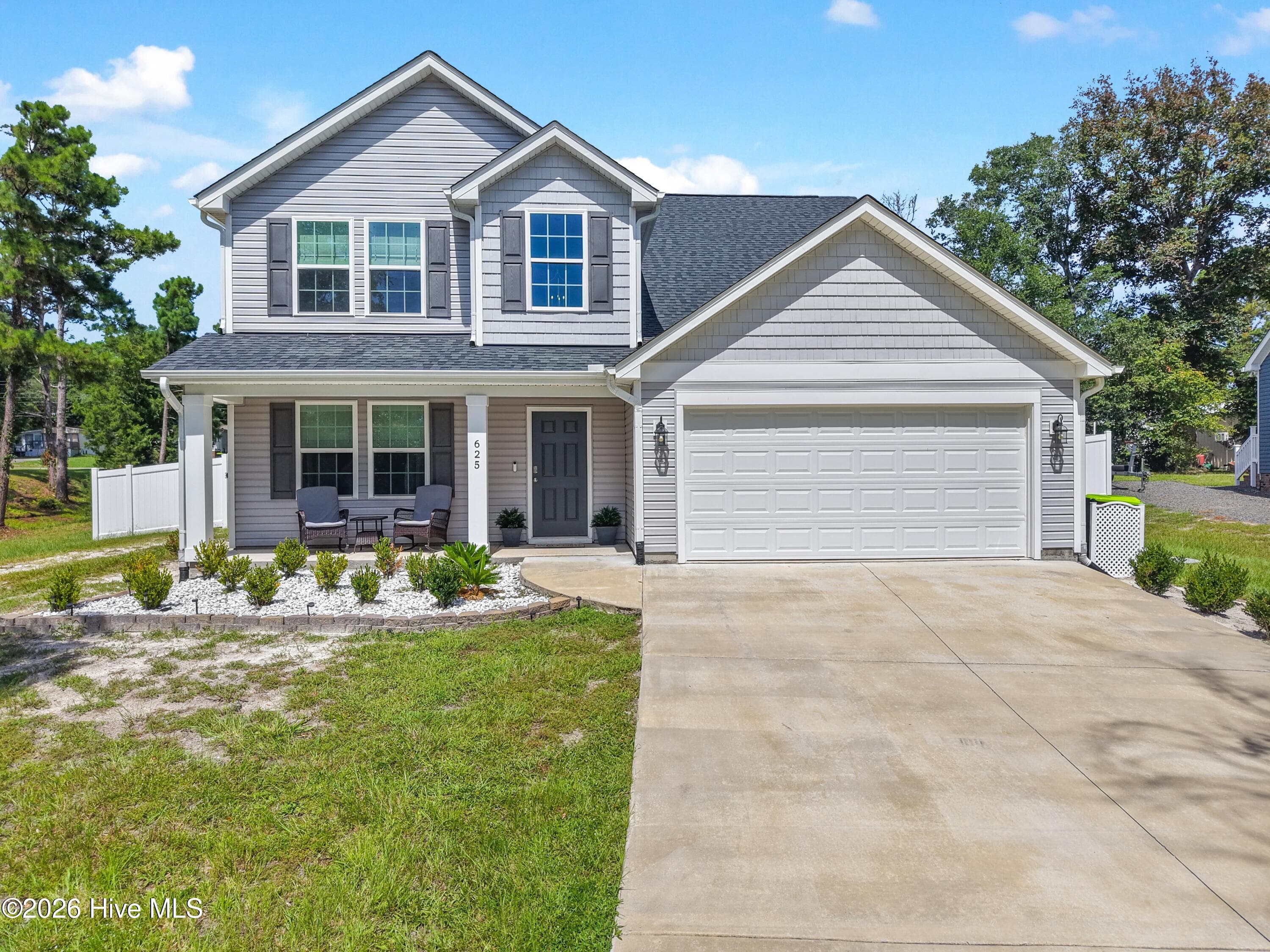 Front of 625 Millslough Lane, Sunset Beach, NC 28468