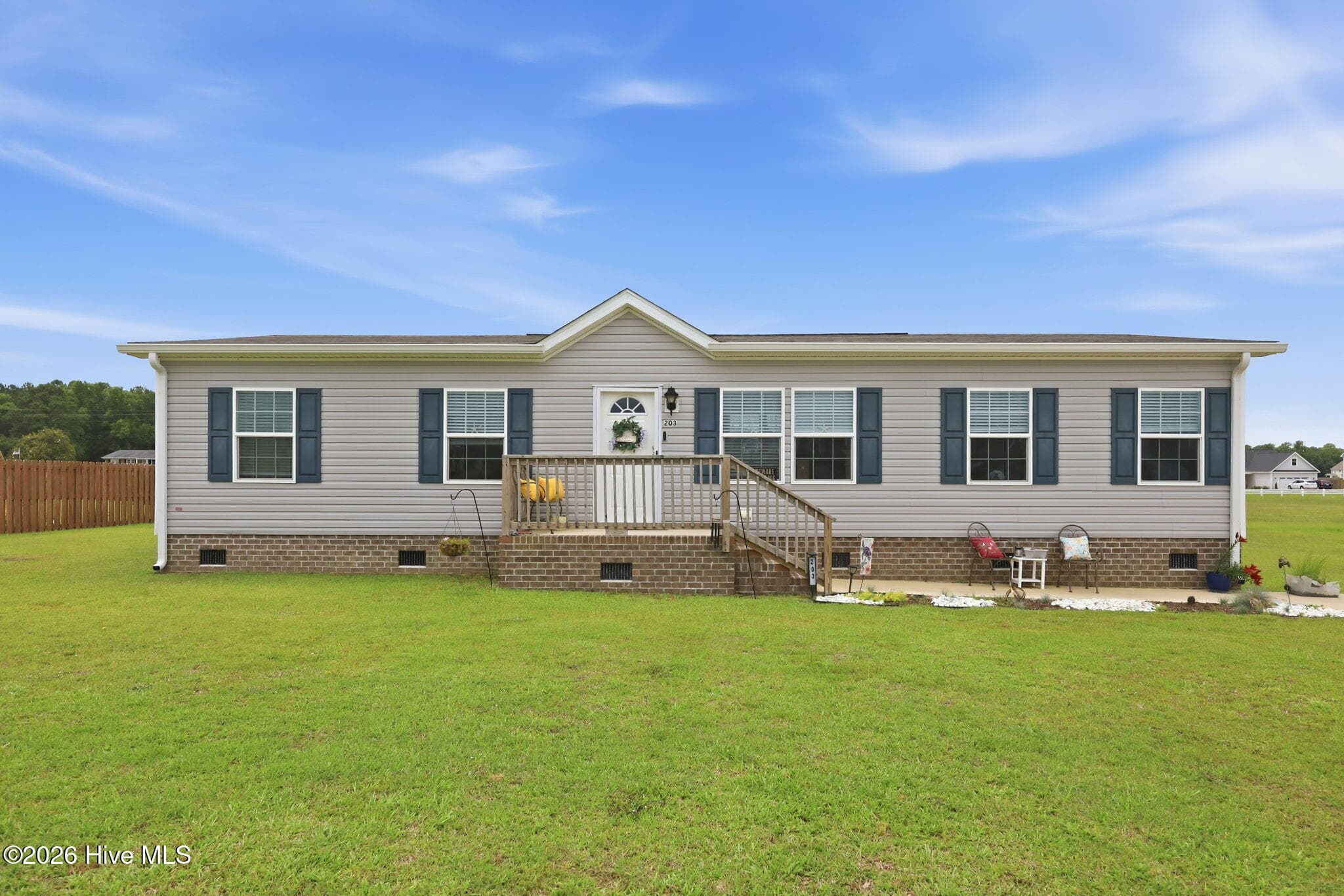 Front of 203 Magnolia Drive, Stella, NC 28582