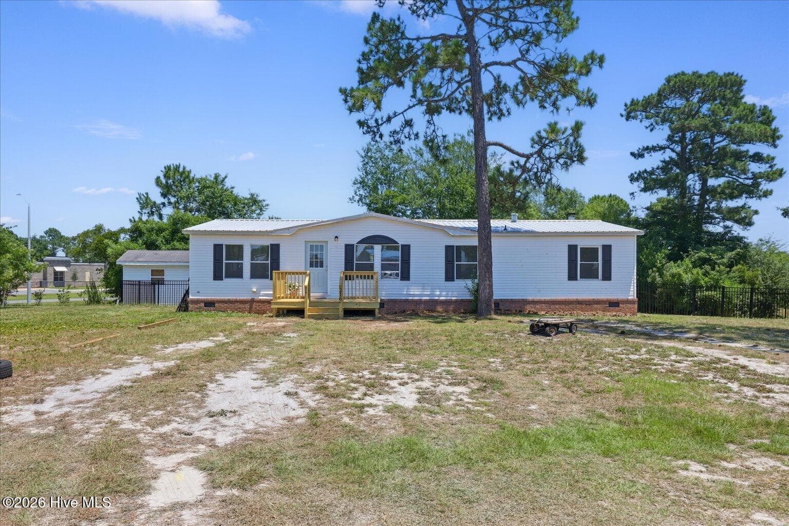 Front of 216 Oak Grove Drive, Hampstead, NC 28443