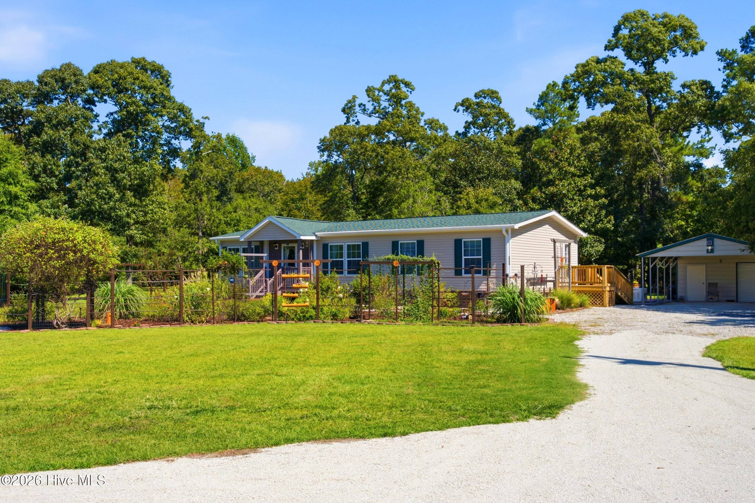 Front of 223 Blue Top Road, Jacksonville, NC 28540